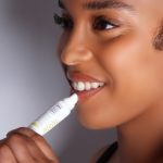 lipglam applying to lips